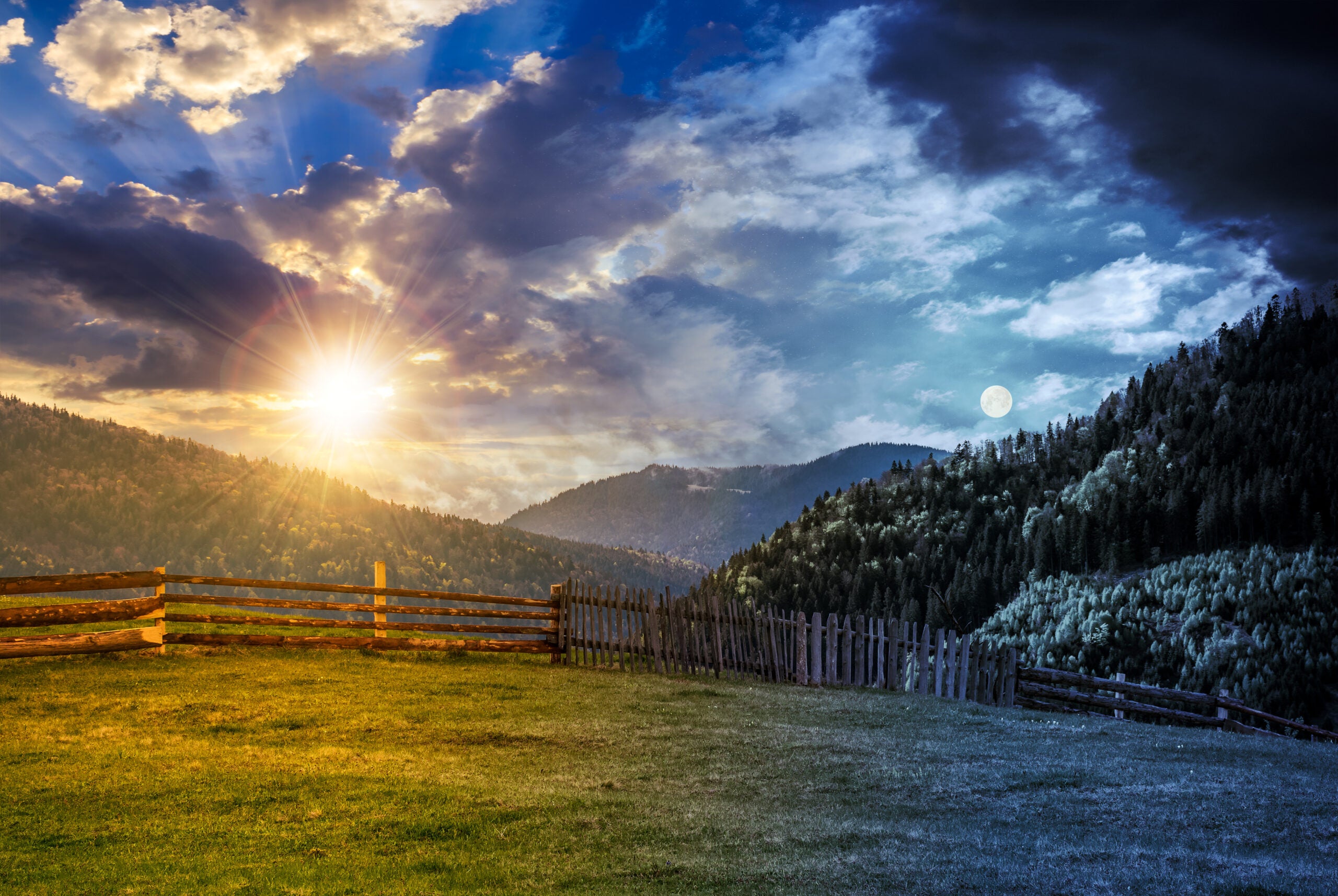 fence through the grassy meadow in mountains time change from summer to winter concept